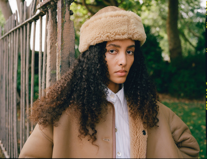 TAN LEATHER BACK CURLY HAIR SHEEPSKIN CAP