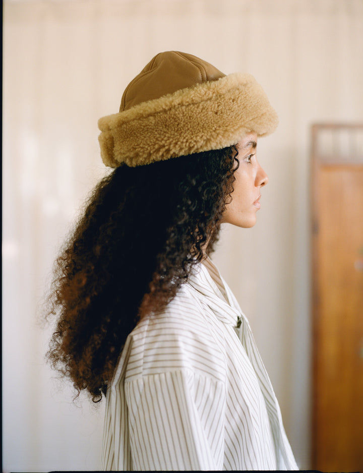 TAN LEATHER BACK CURLY HAIR SHEEPSKIN CAP