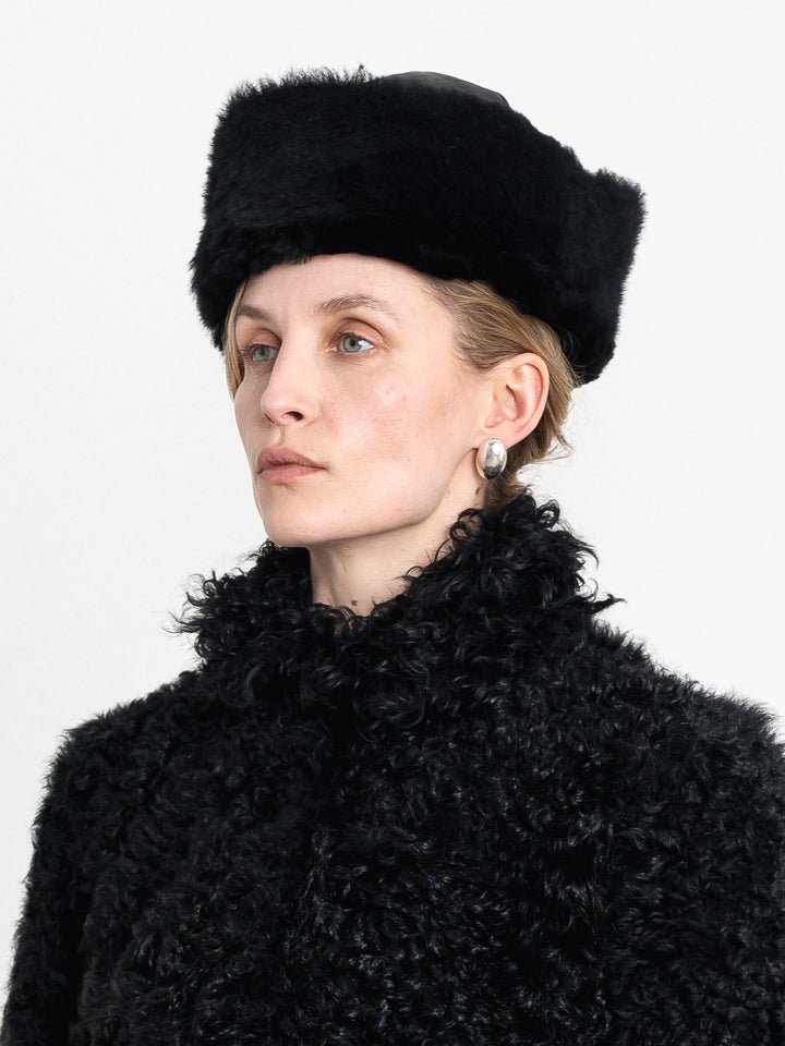 LEATHER BACK CURLY HAIR SHEEPSKIN CAP