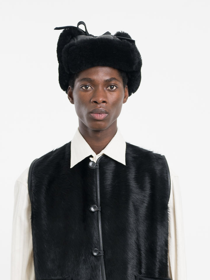 LEATHER BACK STRAIGHT HAIR TRAPPER HAT