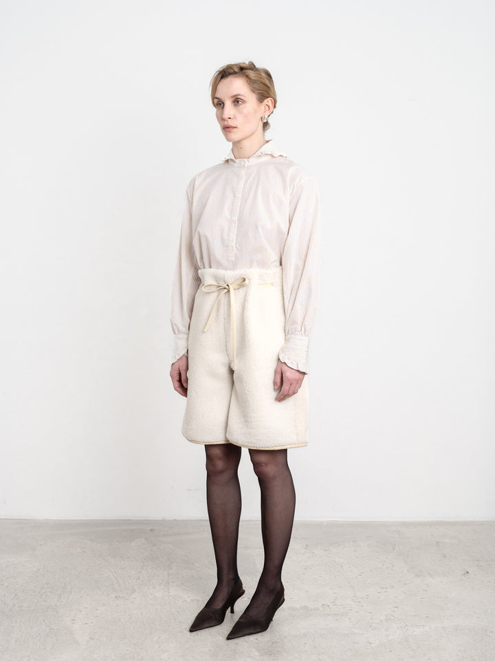 LEATHER BACK CURLY HAIR SHEEPSKIN DRAWSTRING  SHORT